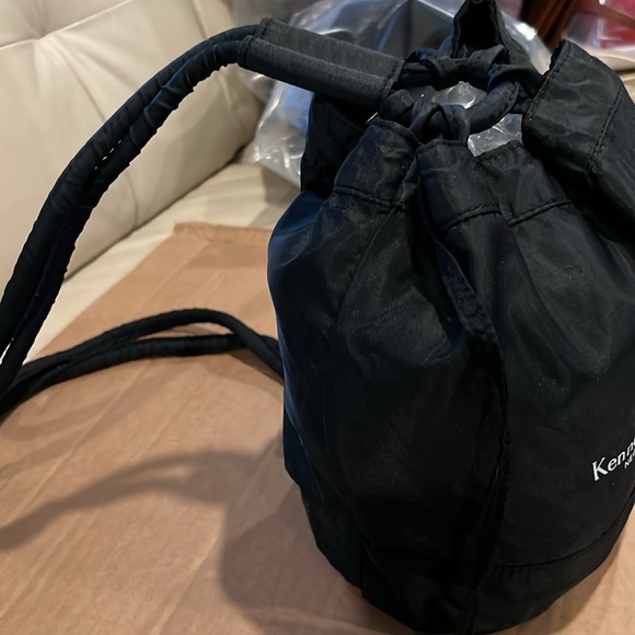 Kenneth Cole  reversible drawstring top mini satin backpack. - Picture 2 of 8